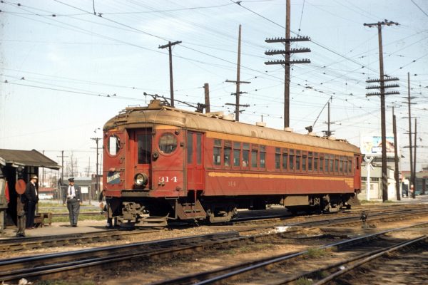 Metropolitan Coach Lines 314 outbound on the Bellflower Line at 9th St and Hooper in Los Angeles c1958. Photgrapher Bob Loewing. SCRM Collection
