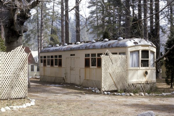 PE 179 repurposed as a cabin in Crestline, CA circa 1974. Photogrpapher Brian Norden