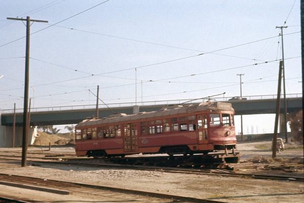 During 1960, LAMTA 1812 at Morgan Yard in Long Beach sits on the truck loading ramp. 1812 will be loaded onto a truck and driven to the Orange Empire Trolley Museum for preservation.
Charles Seims Photo