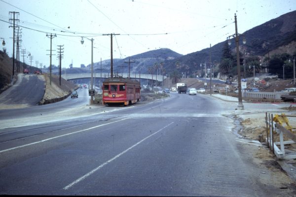 PE 5123 inbound from the San Fernando Valley exits   Cahuenga Pass, entering Highland Blvd adjacent to the Hollywood Bowl in 1952. Photographer Walter Abbenseth, Southern California Railway Museum Collection