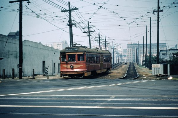 PE 5123 on the Watts Local Line turns south onto San Pedro St from the viaduct at the 6th & Main  St station on July 25, 1953.  Photographer Ray Ballash, Southern California Railway Museum Collection.