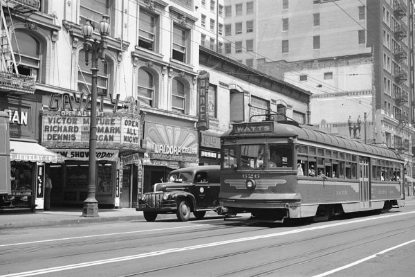 Pacific Electric 626 on the Sierra Vista-Watts Local Line runs southbound on Main St near 5th St in Los Angeles, circa 1949. Photographer Bob Loewing, Southern California Railway Museum Collection.