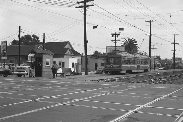 LAMTA 1801 with the inbound Watts Local crosses Vernon Ave and the LAMTA V Line, October 30, 1959. Photographer Stan Kistler, Jeffrey J Moreau Collection.