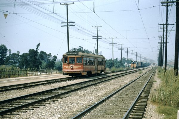 MCL 5112 with an outbound Watts Local just south of the Firestone Blvd overpass, August 11, 1957. Photographer Ray Ballash.
