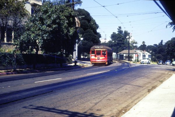 PE 5112 Hollywood Blvd Line Turning from private right-of-way onto Hawthorn Ave near Poinsettia Pl circa 1955.  Walter Abbenseth Collection.