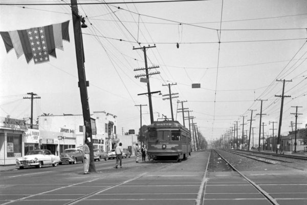 Bound for Watts, PE 5166 with the Watts Local stops for passengers at Vernon Ave.  Jeffrey J Moreau Collection.