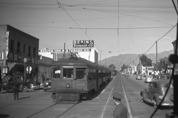 Taken a northbound train at Fair Oaks and California St in Pasadena, PE 637 leads a three car train inbound to Los Angeles with special service for the Tournament of Roses parade on New Years Day 1941. Photographer Frank J Bradford.