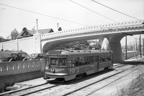 PE 716 on the Hollywood Blvd-Venice Blvd Local Line passes under the West Blvd overpass at Vineyard on its was to Los Angeles and Hollywood, circa 1947.  Raymond E Younghans Collection.