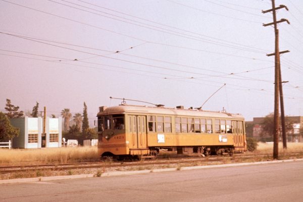 LATL 1423 on the 5 line, northbound on Eagle Rock Blvd at Ave 37 on May 1, 1955.  Photographer Andy Payne.