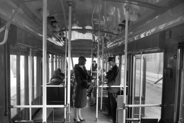 Los Angels Railway photo of conductor collecting fares in 2601.